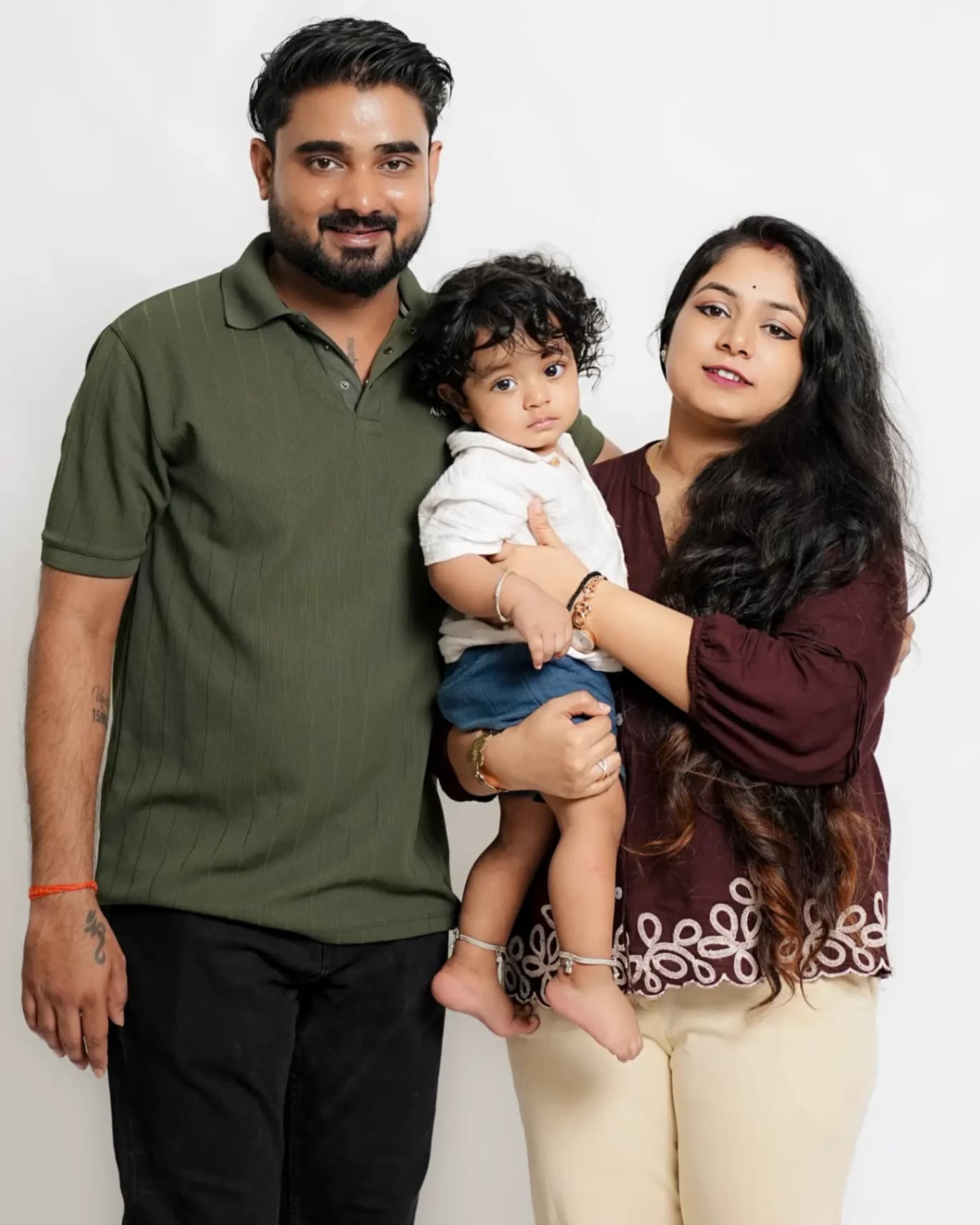 Bump to Blossom founders Himanshu and Pooja Patel with their child